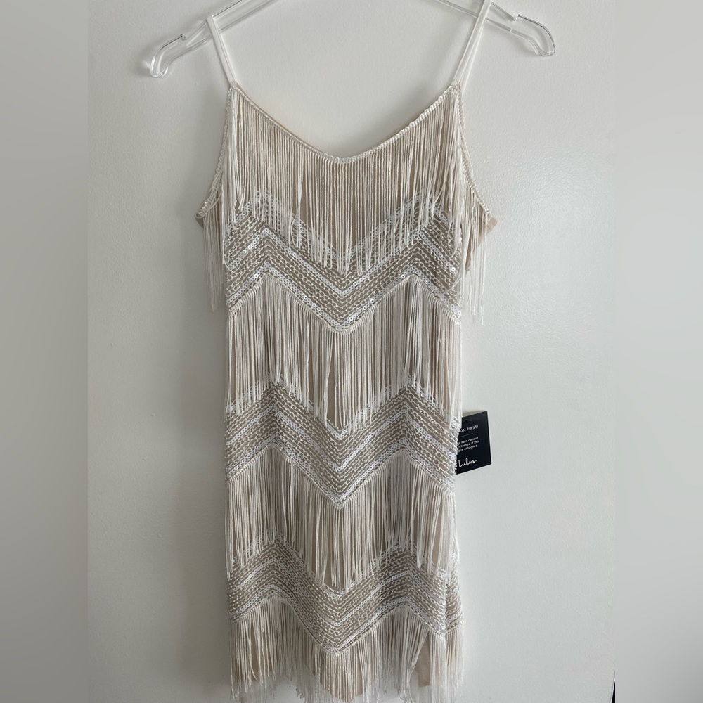 Stunning fringe mini! Never worn!